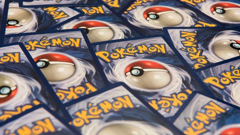 100 Assorted Pokemon Trading Cards.